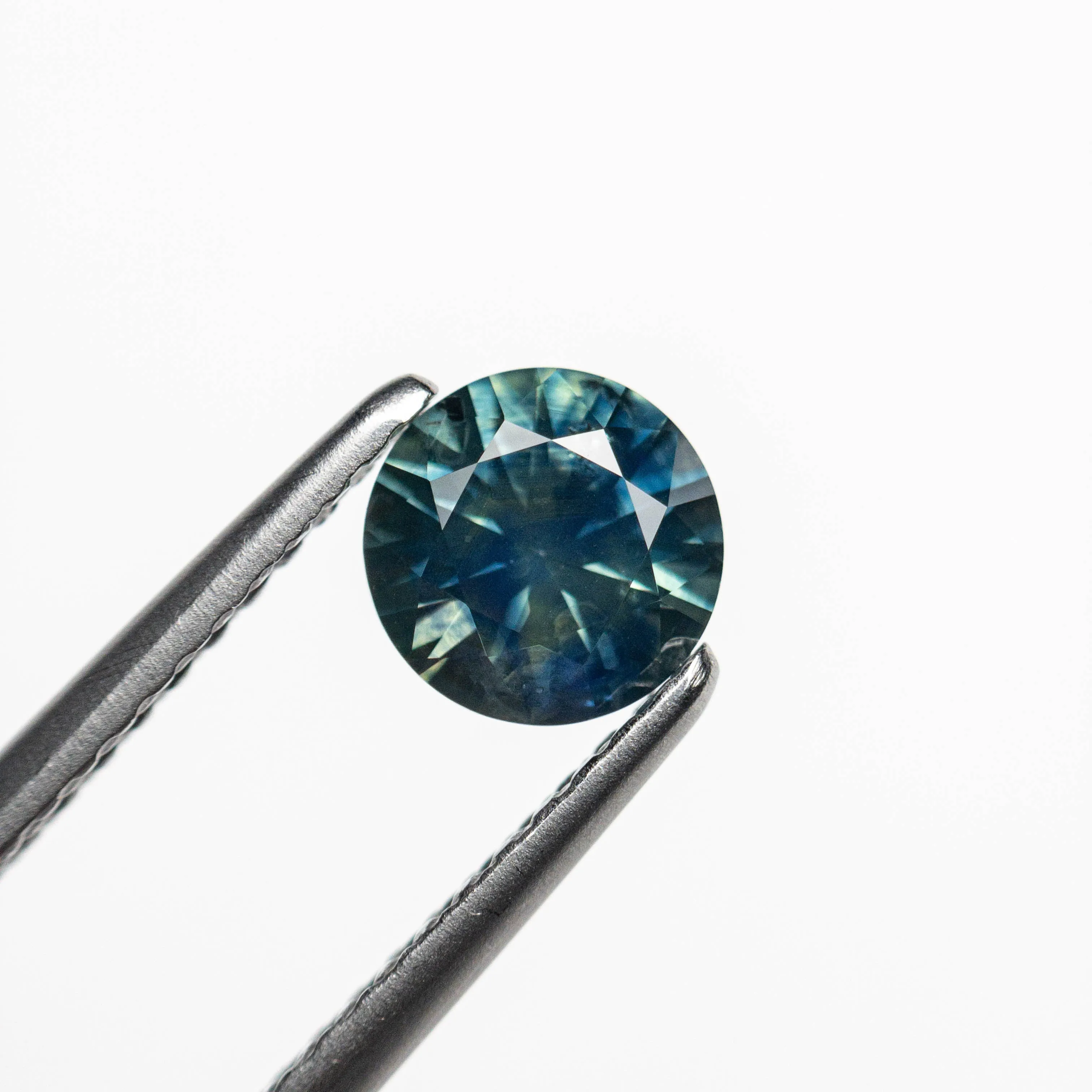 0.73ct 5.55x5.53x3.55mm Round Brilliant Sapphire 19942-13