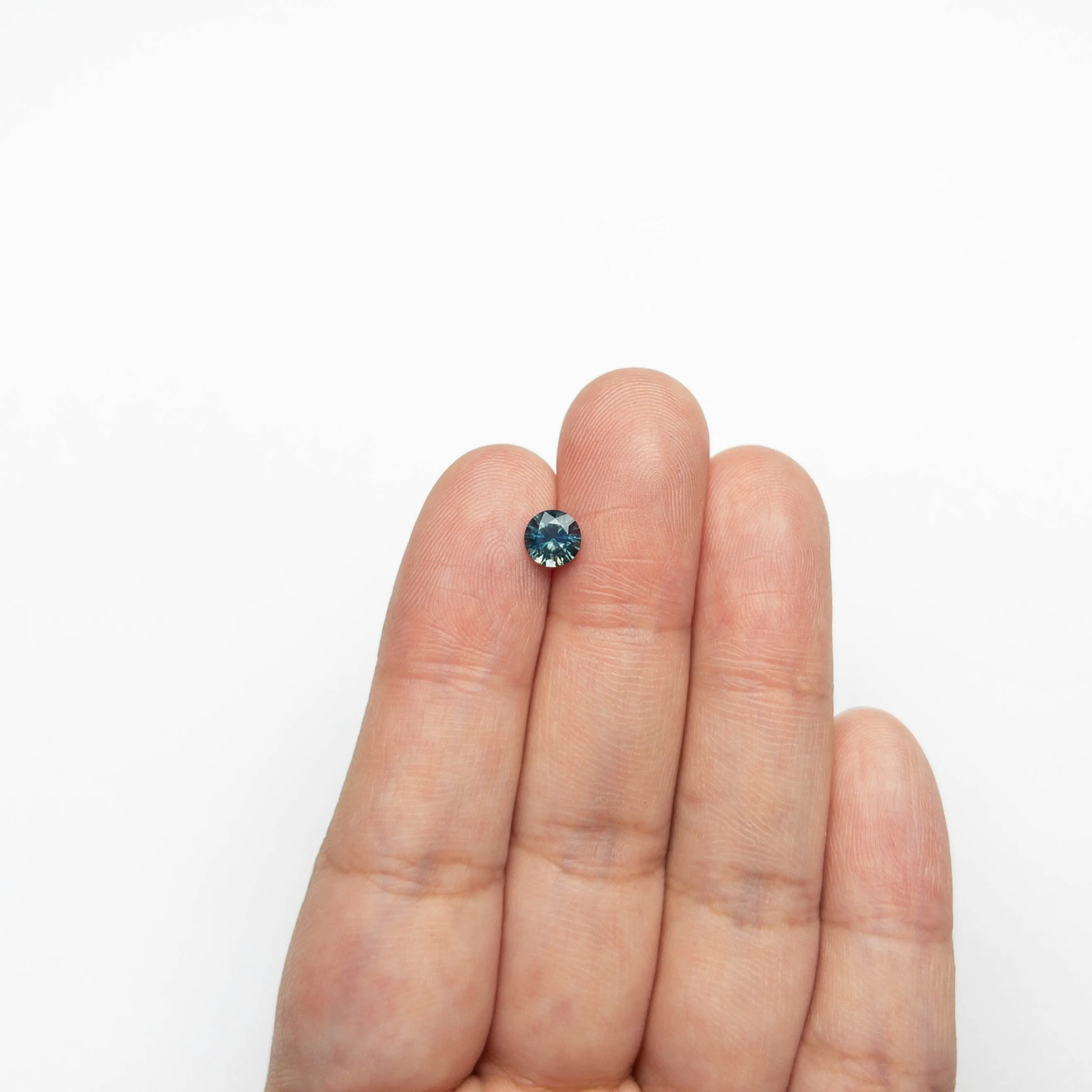 0.73ct 5.55x5.53x3.55mm Round Brilliant Sapphire 19942-13