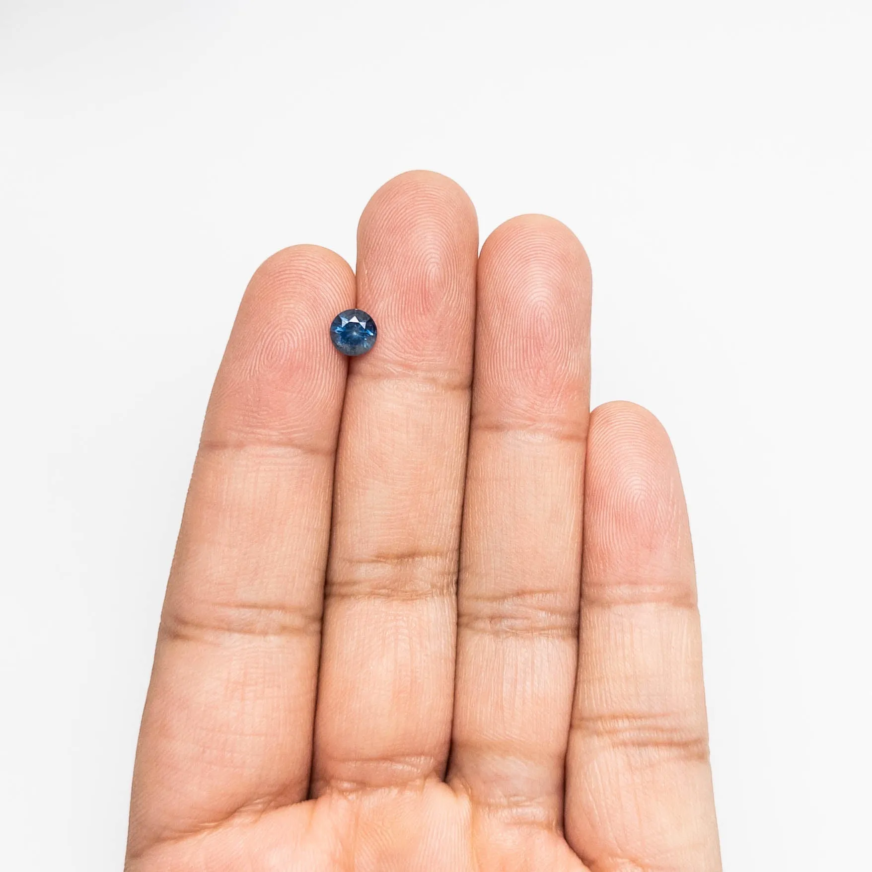 0.81ct 5.67x5.58x3.75mm Round Brilliant Sapphire 19942-33