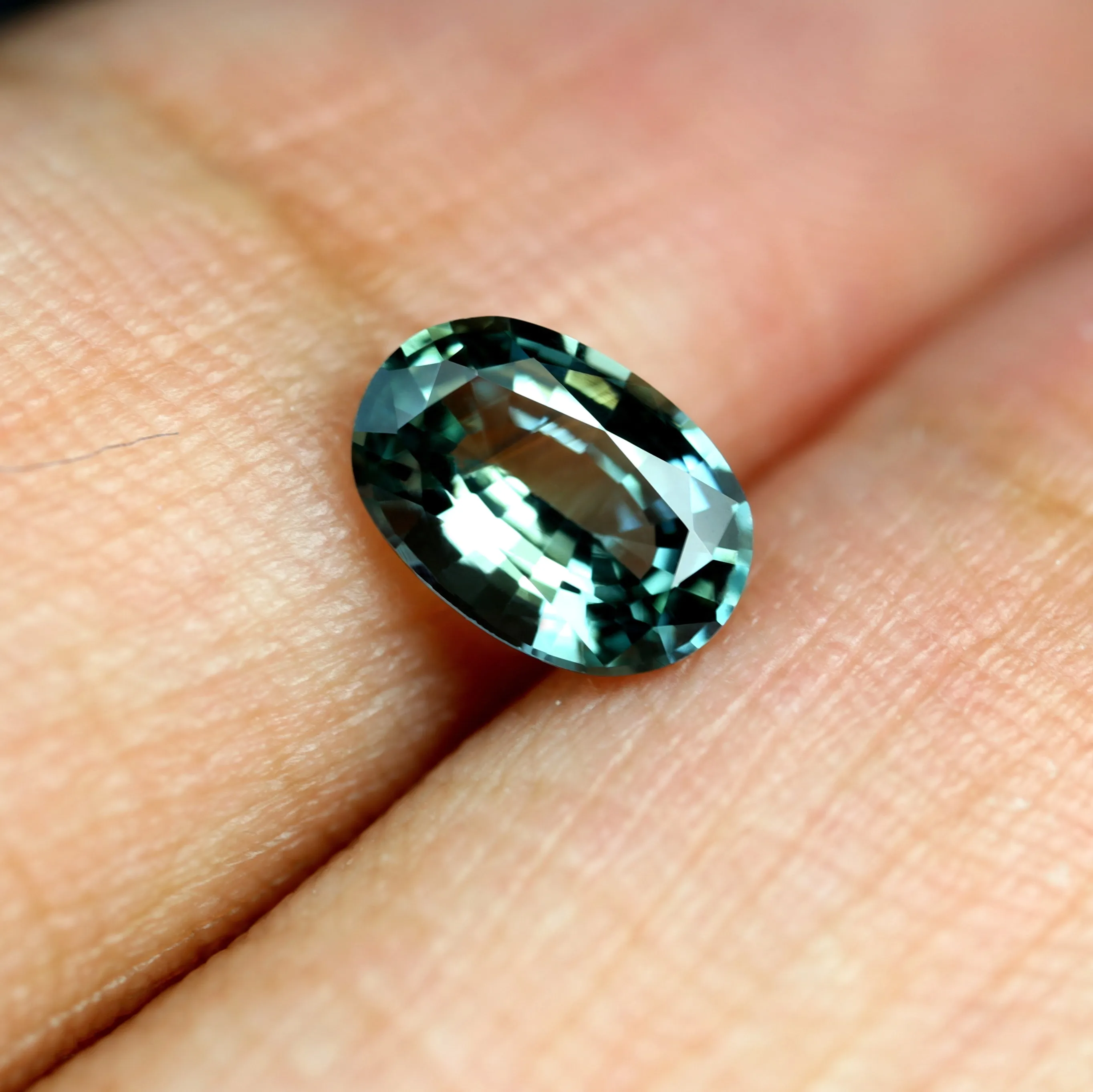 0.84ct Certified Natural Teal Sapphire