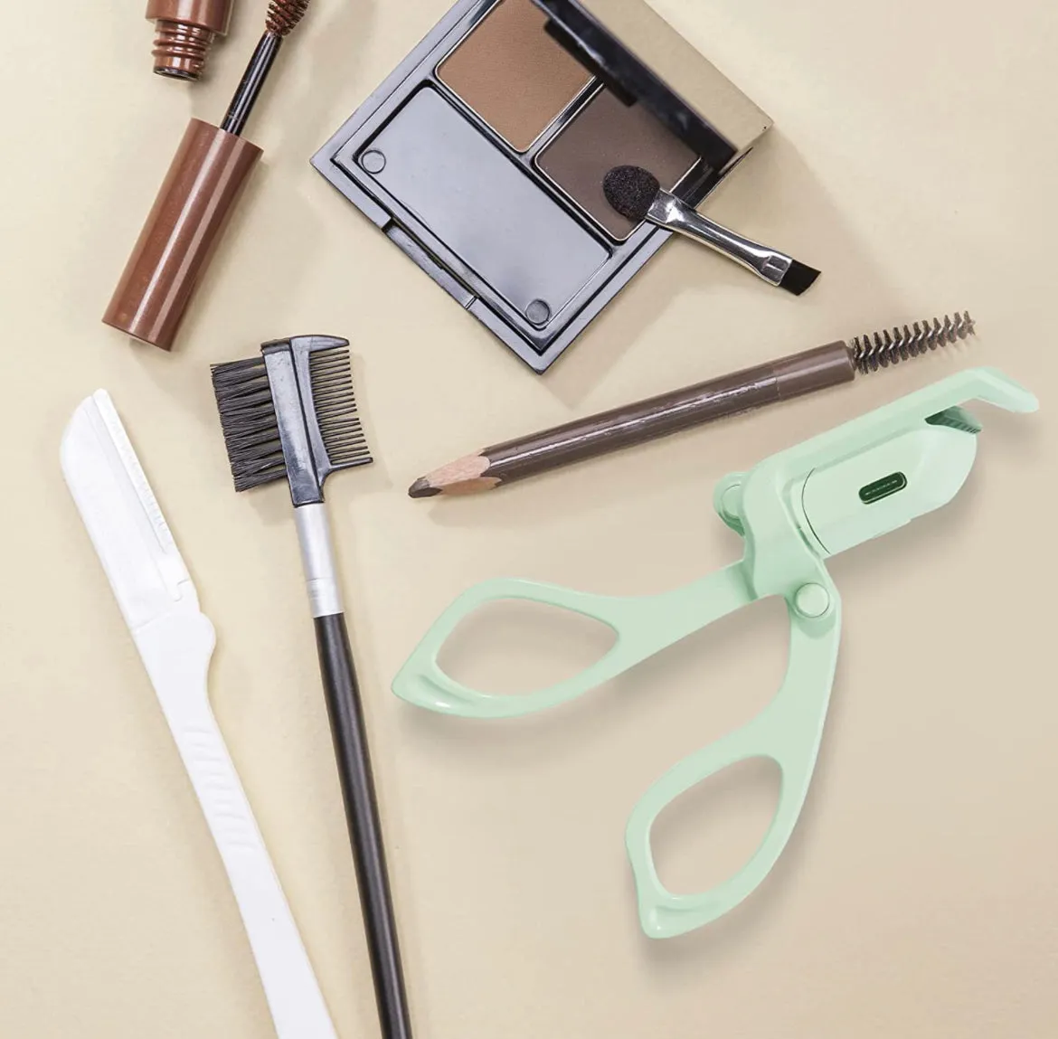 HEATED EYELASH CURLER