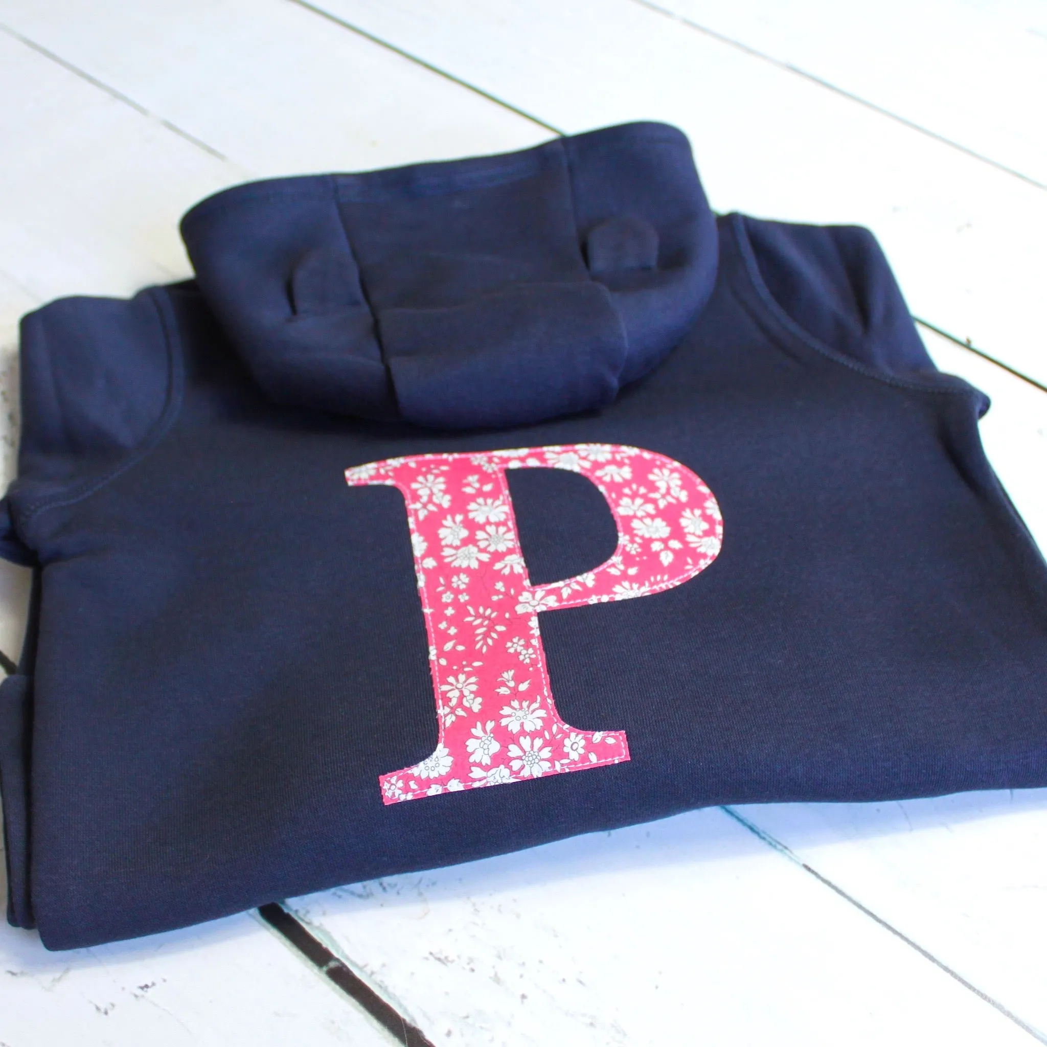 Initial onesie with knee patches