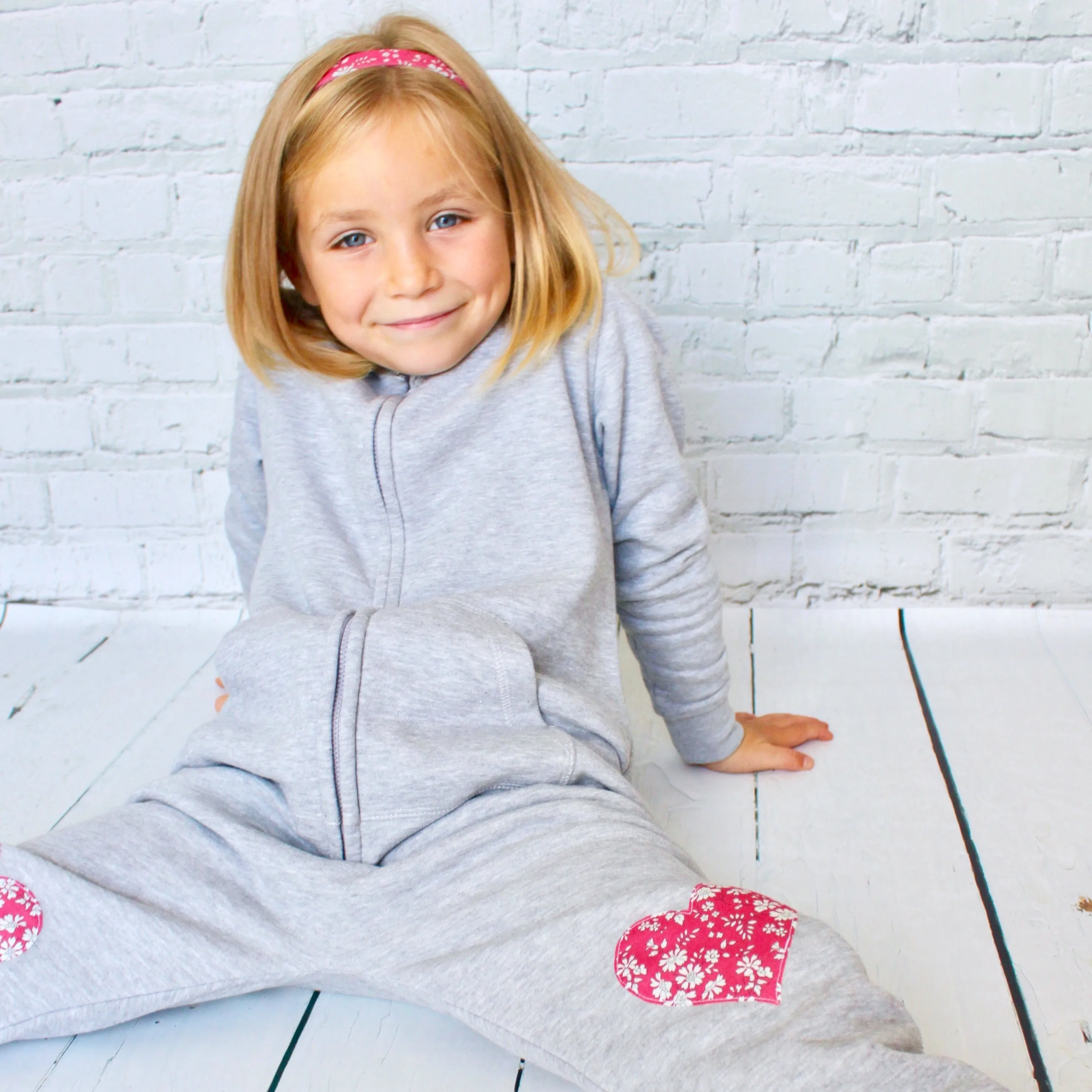 Initial onesie with knee patches