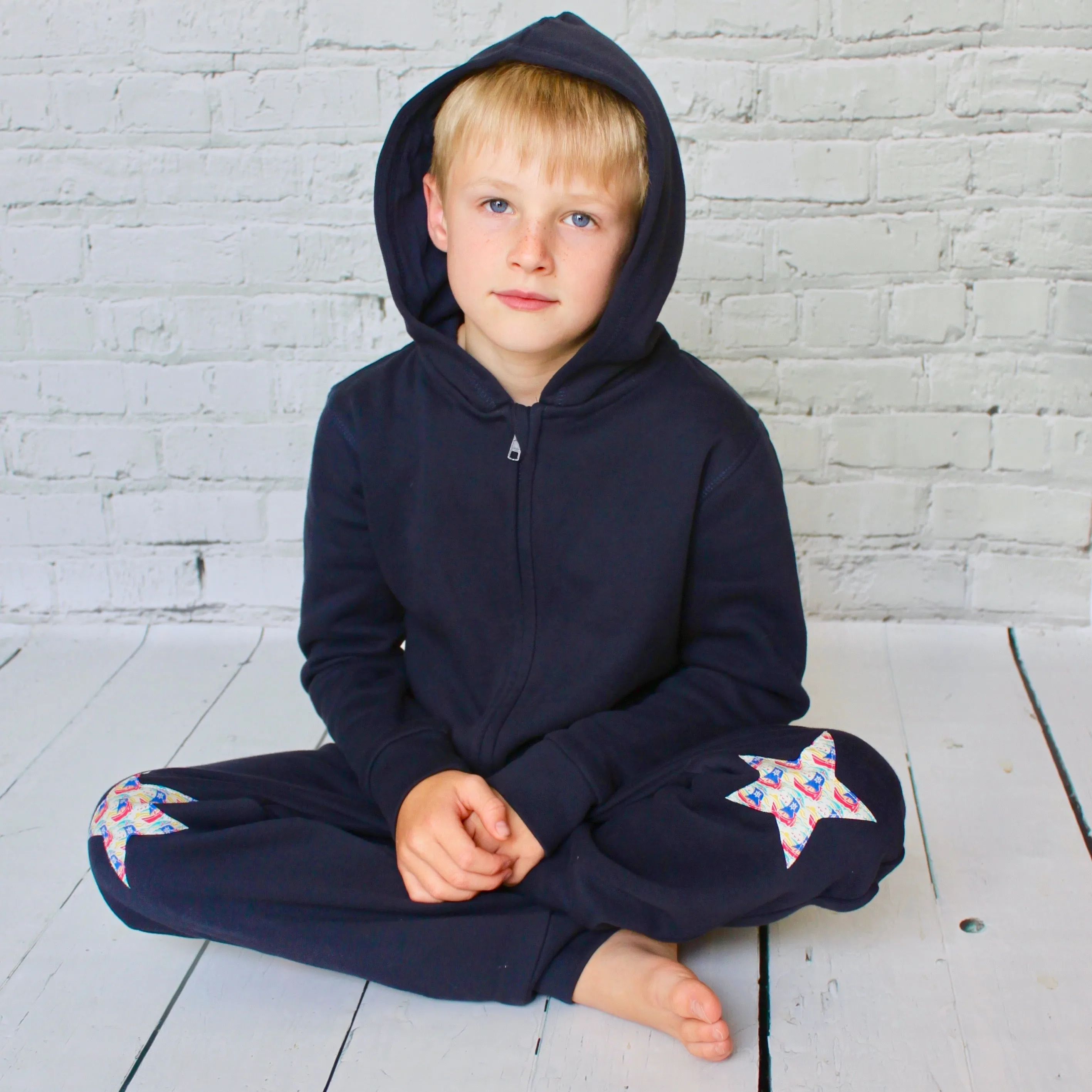 Initial onesie with knee patches