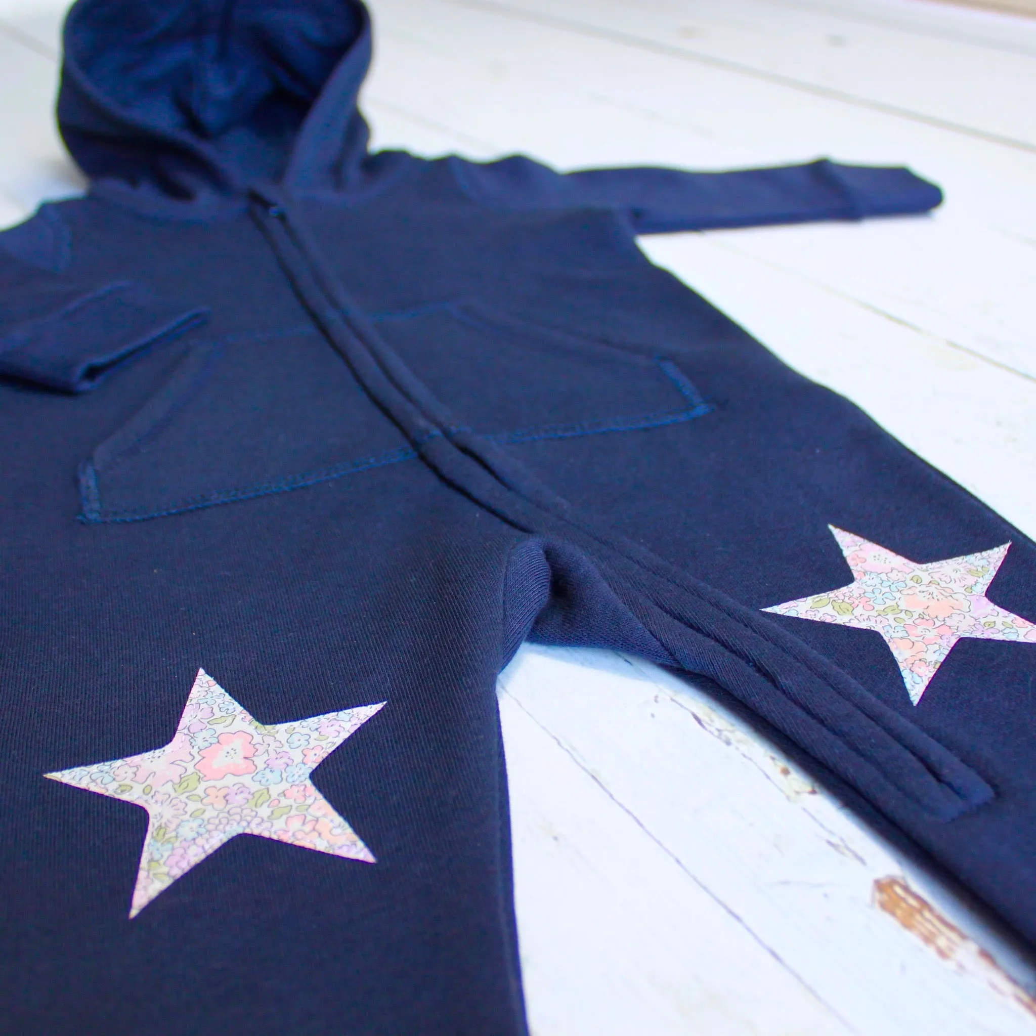 Initial onesie with knee patches