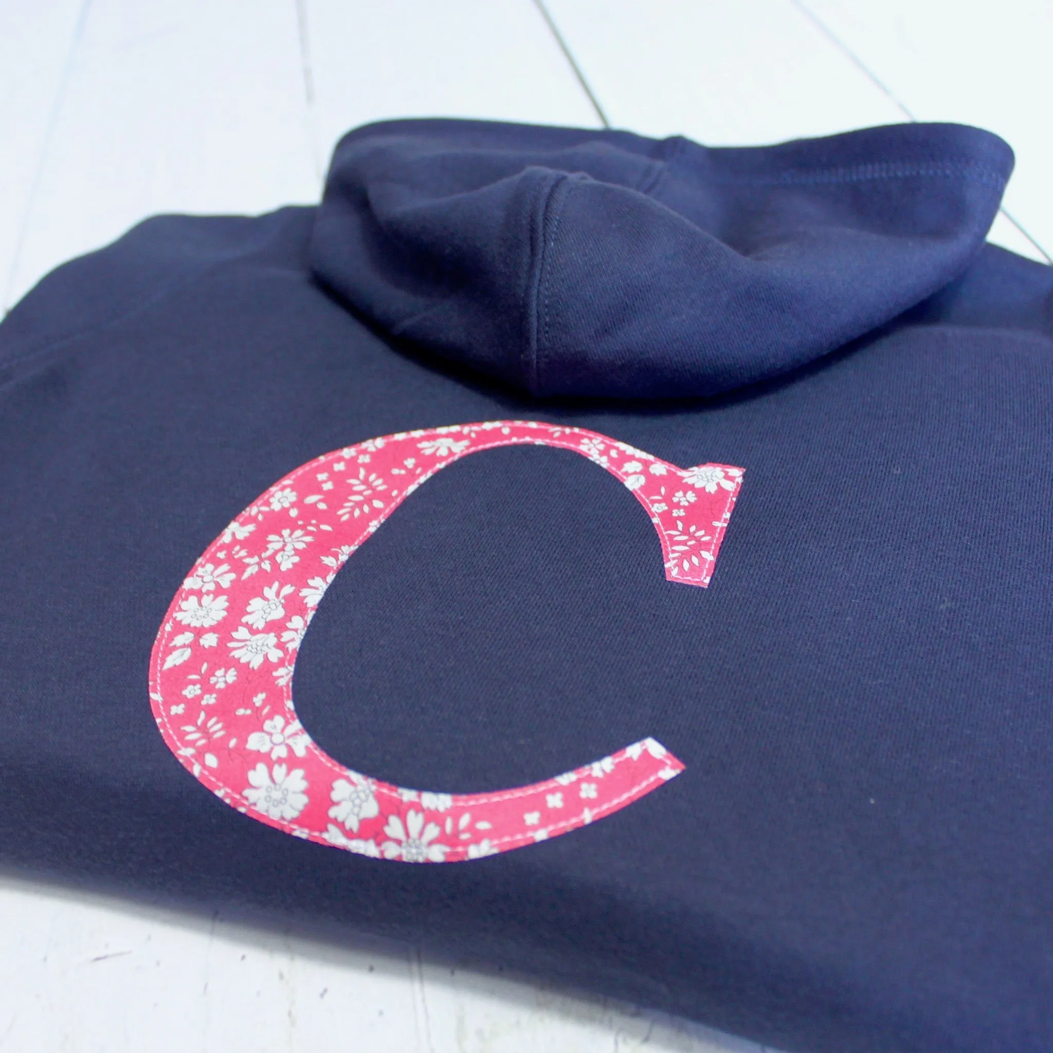 Initial onesie with knee patches
